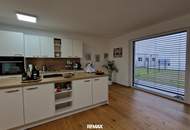 Exklusive 3-Zimmer-Gartenwohnung mit zwei PKW-Abstellplätzen