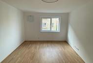 Moderne Neubauwohnung im Zentrum – mit Loggia u. Lift ! TIEFGARAGENPLATZ und KONTROLLIERTE WOHNRAUMBELÜFTUNG