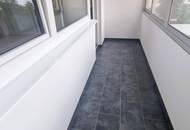 Kernsanierte, helle Dreizimmerwohnung mit großer Loggia und großem Keller!