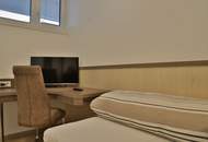 Neuwertige 4-Zimmer-Premiumwohnung möbliert mit 2 Bädern, Eigengarten & 2 Stellplätzen.