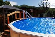 GANZJÄHRIG BEWOHNBAR!!!Pflegeleichter Garten mit Pool, Vollholzhaus Lärche wird verkauft!