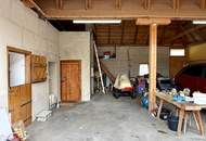 "Charmantes Einfamilienhaus mit Terrasse, Garage und zusätzlichem Grundstück"