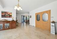 High-end living in a peaceful green location! A feel-good retreat in a class of its own: tradition meets state-of-the-art comfort!