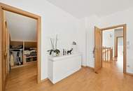 High-end living in a peaceful green location! A feel-good retreat in a class of its own: tradition meets state-of-the-art comfort!