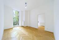 4-Zimmer-Altbauwohnung mit Balkon und Fischgrätparkett in ruhiger Innenhoflage