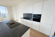 Erstbezug – 3-Zi.-Wohnung mit Rooftop Pool &amp; Sauna