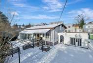 "Ankommen am Promenadenweg: Bungalow im Grünen – nahe Wien mit Potential"