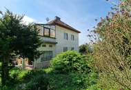 Einfamilienhaus mit Wintergarten in schöner Siedlungslage
