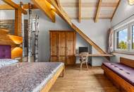 Wohngenuss im Dachgeschoss – Seeblick, Wellnessoase & alpiner Charme vereint