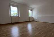 Einladendes Wohnambiente und praktische Raumaufteilung: gemütliche 2-Zimmer-Wohnung mit Grünblick bietet die perfekte Kombination aus naturnahem Wohnen und ausgezeichneter Infrastruktur in Stadtnähe!