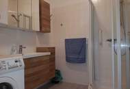 Möblierte 2-Zimmer-Wohnung mit Balkon, Grünblick und Tiefgarage in absoluter Ruhelage