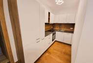 Neuwertige 2-Zimmer-Dachgeschosswohnung mit Balkon und Fernblick