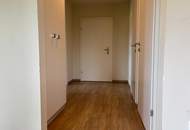 Erdgeschoßwohnung mit eigenem Gartenanteil in zentraler Lage