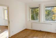 Sonnige, teilsanierte 2-Zimmer-Wohnung mit traumhaftem Grünblick!