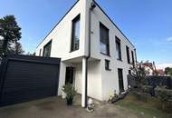 FAMILIENDOMIZIL MIT GARTEN UND GARAGE