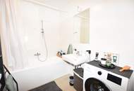 Top vermietete Anlegerwohnung mit Balkon und Tiefgarage - Neuwertig!