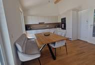 Sonnige, neue 3 Zi-DG-Wohnung mit Terrasse und TG-Platz