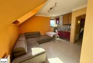 Perfekt geschnittene DG-Singlewohnung mit Terrasse und Garage in Wien Mauer