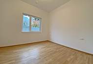 Topmoderne 2-Zimmerwohnung mit Eigengarten und Tiefgaragenstellplatz!