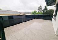 Exklusive 2-Zimmer-Wohnung mit sonniger Süd/West-Terrasse in Jeging