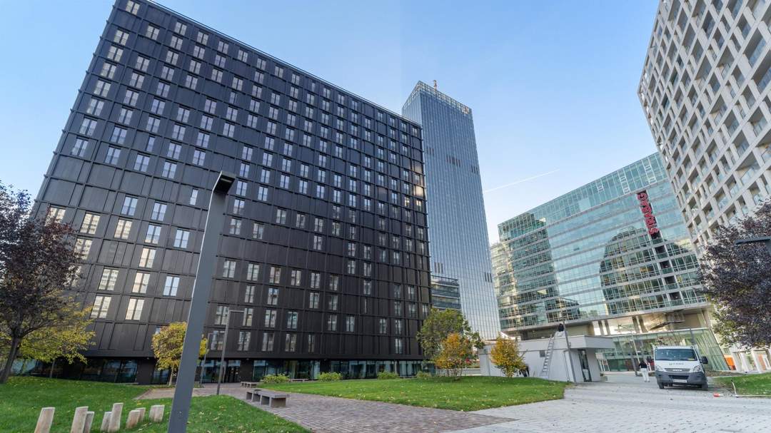 Urbaner Rückzugsort in den DC-Flats mit Terrasse – Wohnen auf höchstem Niveau!