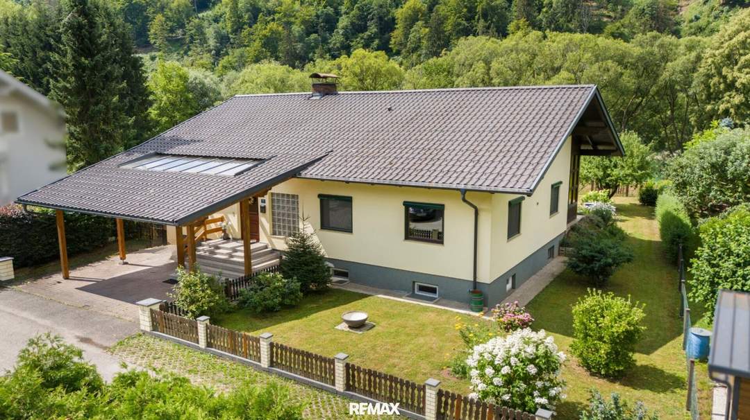 Gartenparadies in einzigartiger Naturlage: Gemütlicher Bungalow mit Wintergarten direkt an der Drau in Lavamünd