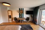 Moderne Wohnung mit wunderschönem Seeblick, inklusive Möbeln und Carport!
