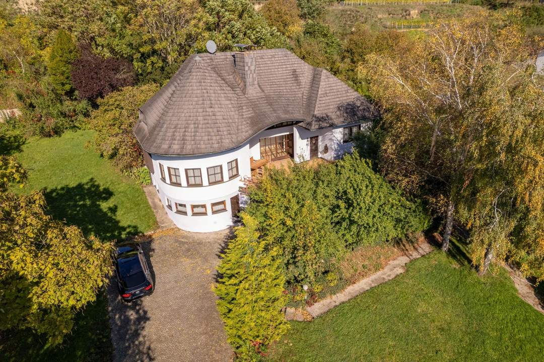 Einzigartiges Haus in Südlage mit unverbaubarem Fernblick auf leichter Hanglage