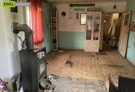 7,6 % Rendite – vermietete Doppelhaushälfte mit zusätzlicher Wohneinheit zur Renovierung und Selbstnutzung.