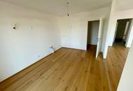 ERSTBEZUG! Geräumige Eigentumswohnung im Obergeschoss mit Balkon und Dachterrasse