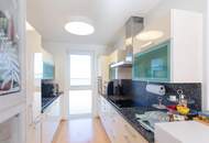 Rooftop-Oase mit Rundumblick: Schöne 4-Zimmer-Wohnung mit 96 m2 Sonnenterrasse und Whirlpool