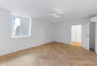 Luxuriöse Dachgeschosswohnung in toller Lage des 4. Bezirks mit schönem Ausblick über Wien