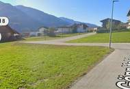 Voll erschlossenes Baugrundstück in 5722 Niedernsill, mit Blick auf die Gipfel der Hohen Tauern
