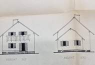 Älteres Wohnhaus mit angebauter Doppelgarage im Freiland