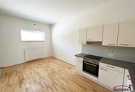 Helle 2-Zimmerwohnung mit Terrasse und Gartenanteil!