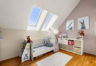 Wohnen über den Dächern von Graz mit Blick auf den Schlossberg: Exklusive Stadtwohnung mit Terrasse