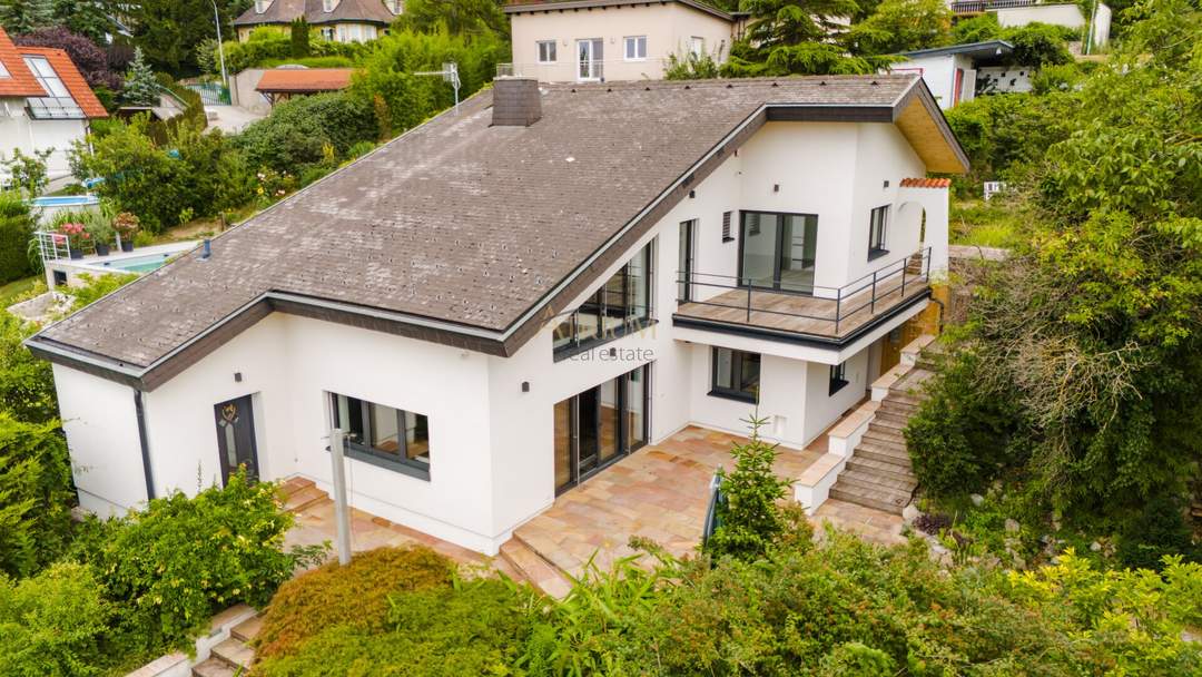 Exklusive Architektenvilla mit Schwimmteich, Gästehaus und idyllischem Garten