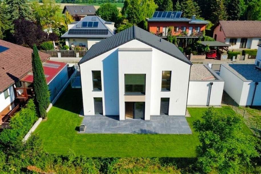 Exklusives 5-Zimmer-Einfamilienhaus mit Garage - Schlüsselfertig - Großzügige Wohnflächen trifft auf idyllischen Eigengarten - Wohnkomfort auf höchstem Niveau, Haus-kauf, 690.000,€, 3422 Tulln