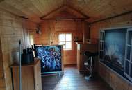 Sanierungsbedürftiges Zweifamilienhaus mit Nebengebäuden in Traumlage