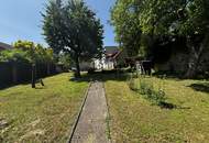 Traumhaftes Mehrfamilienhaus-Ensemble: 3 Wohneinheiten, XL-Garten, 2 Garagen!