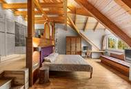 Wohngenuss im Dachgeschoss – Seeblick, Wellnessoase & alpiner Charme vereint