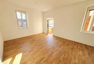 Charmante 2-Zimmer-Wohnung in saniertem Altbau mit Balkon und Garten