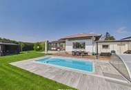 Moderner Bungalow mit Pool, Garage und Traumgarten – Wohnen auf einer Ebene