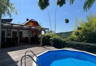 Wohnhaus mit wunderschönem Garten und Pool in erhöhter Lage!