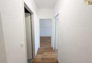 Lichtdurchflutete 3-Zimmer-Wohnung mit neuem Parkettboden, Grünblick und Garage