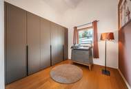 Lichtdurchflutete Dachwohnung mit Terrasse und privatem Garten