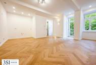 Hochwertiger Erstbezug - in wunderschönem Haus: Großzügige 4-Zimmer-Wohnung mit privater Freifläche