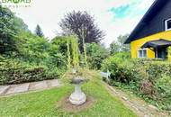Exklusives Einfamilienhaus über dem Wörthersee mit traumhaftem Panoramablick und malerischen Garten