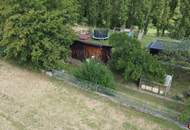 Unterkellertes Einfamilienhaus mit Garage und Obstbaumbestand