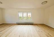 Top sanierte 3-Zimmer-Wohnung mit neuer Küche und Garage!